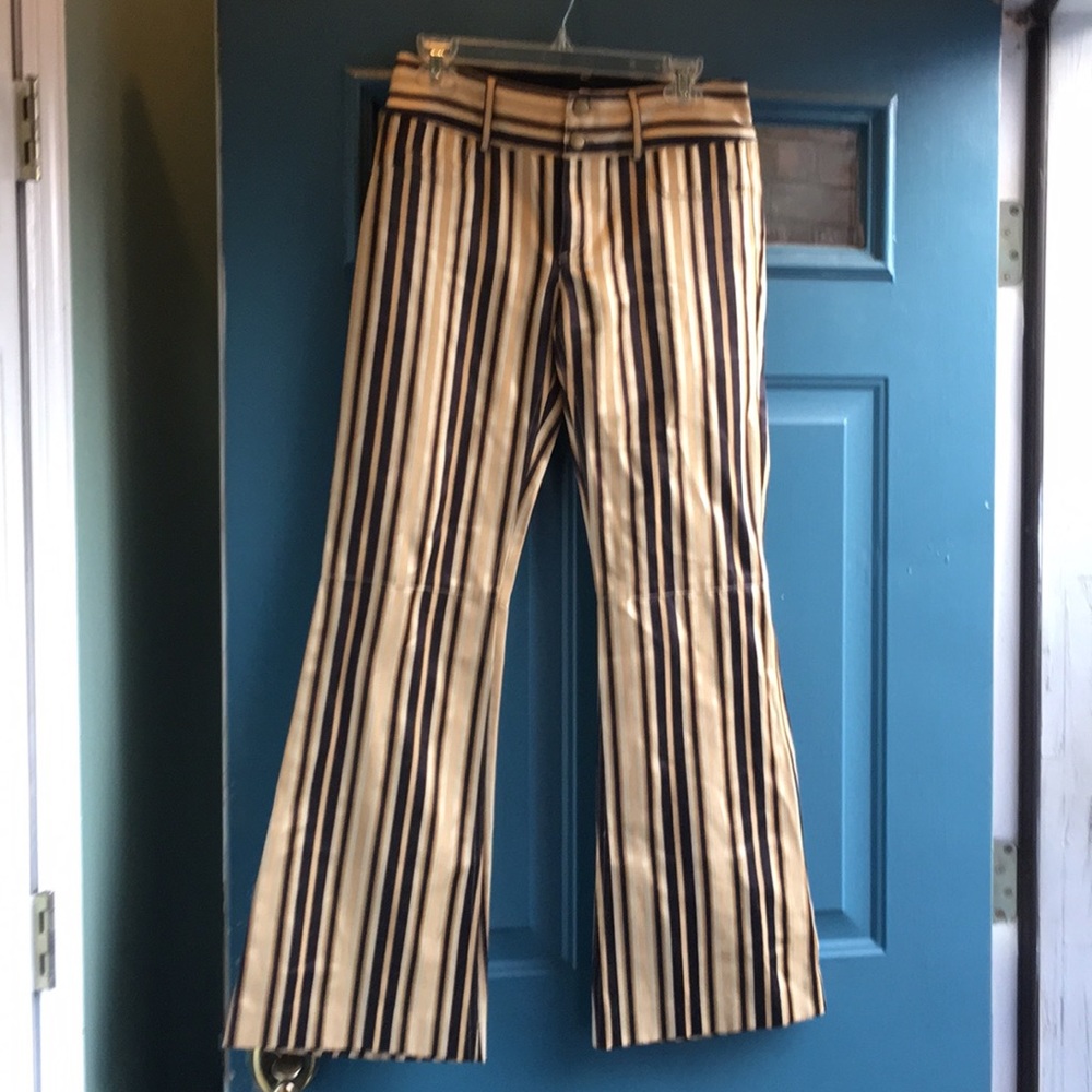 Alice and Olivia striped pants. Black and gold